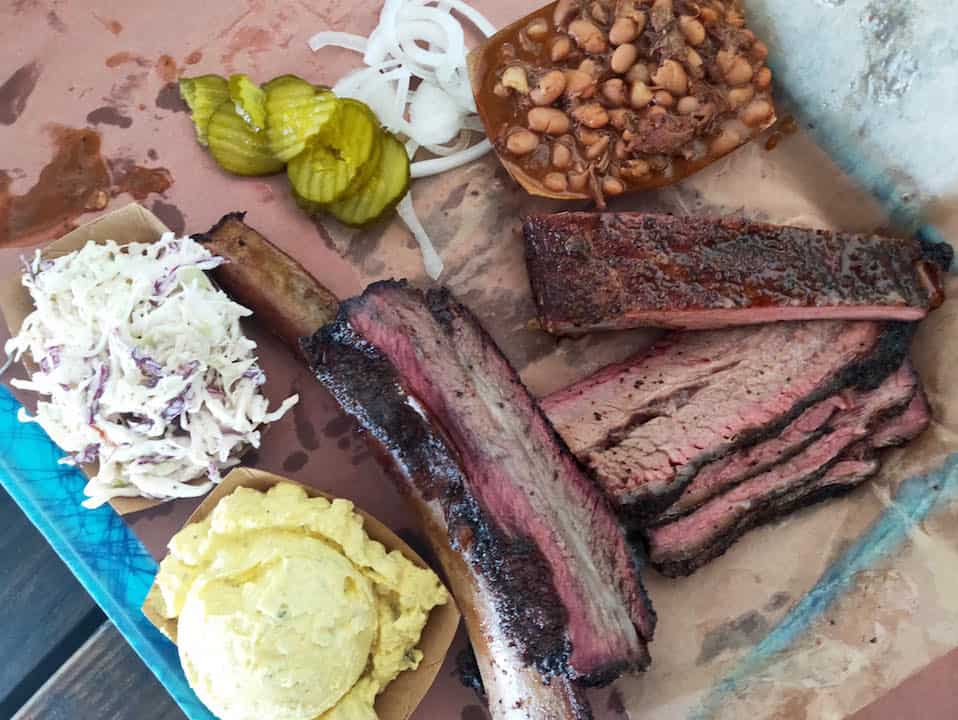 Brisket, ribs, beans, potato salad, cole slaw, pickles all from Franklin BBQ