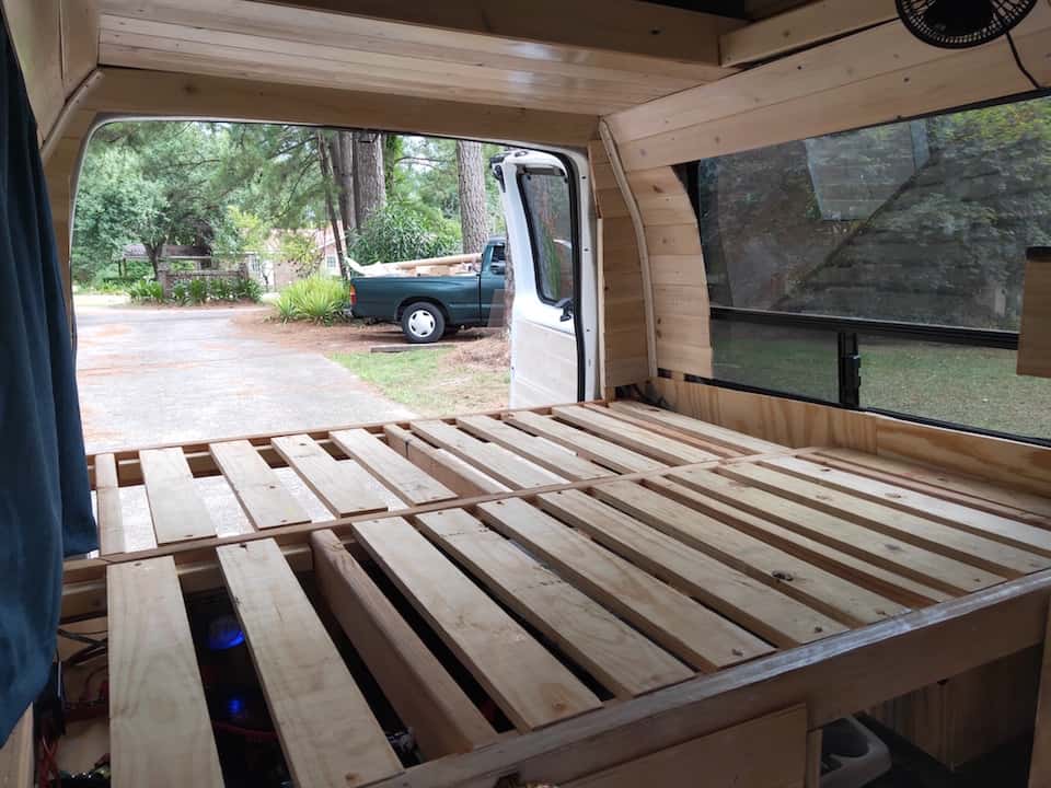 The finished bed platform in our DIY van conversion