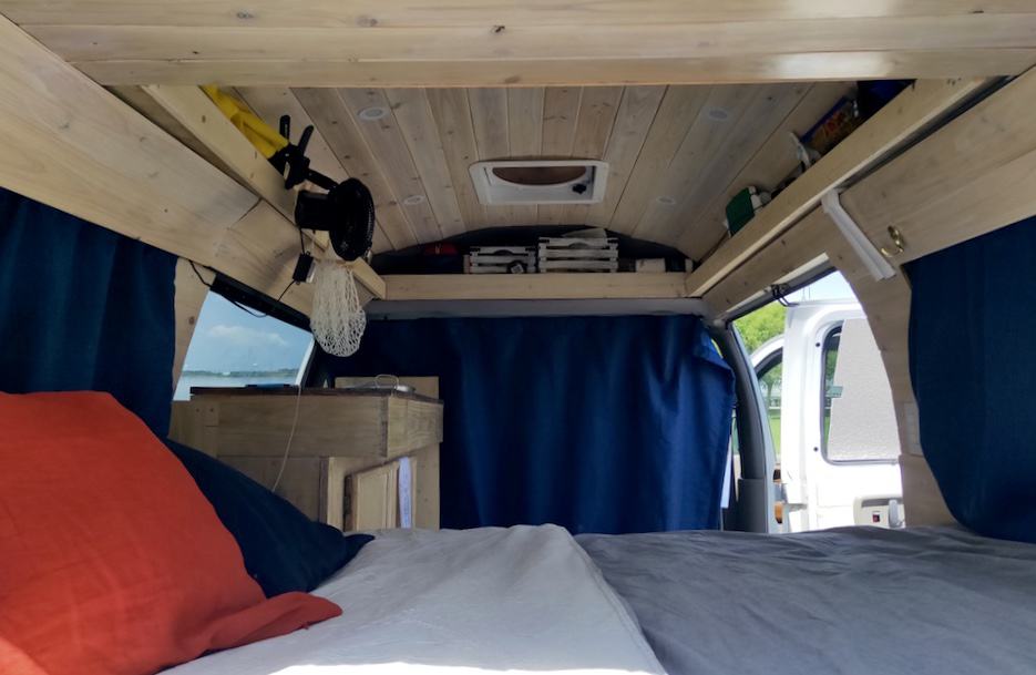 The finished bed in our DIY van conversion