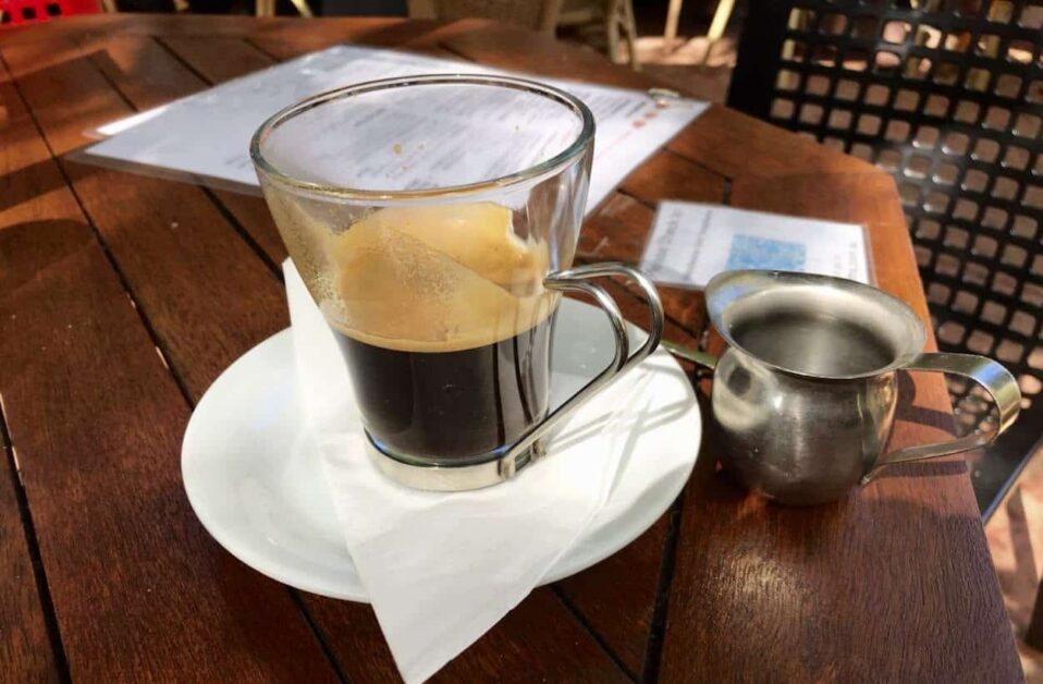 An espresso on a wooden table
