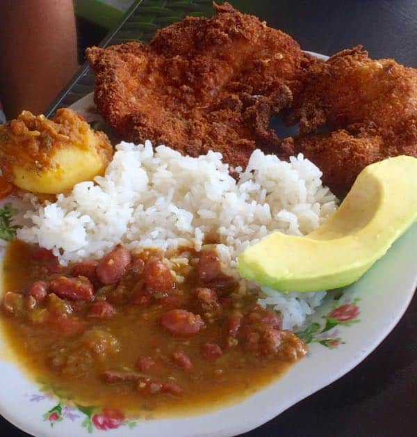 Fried pork chop, beans and rice a staple in the Colombian Foods