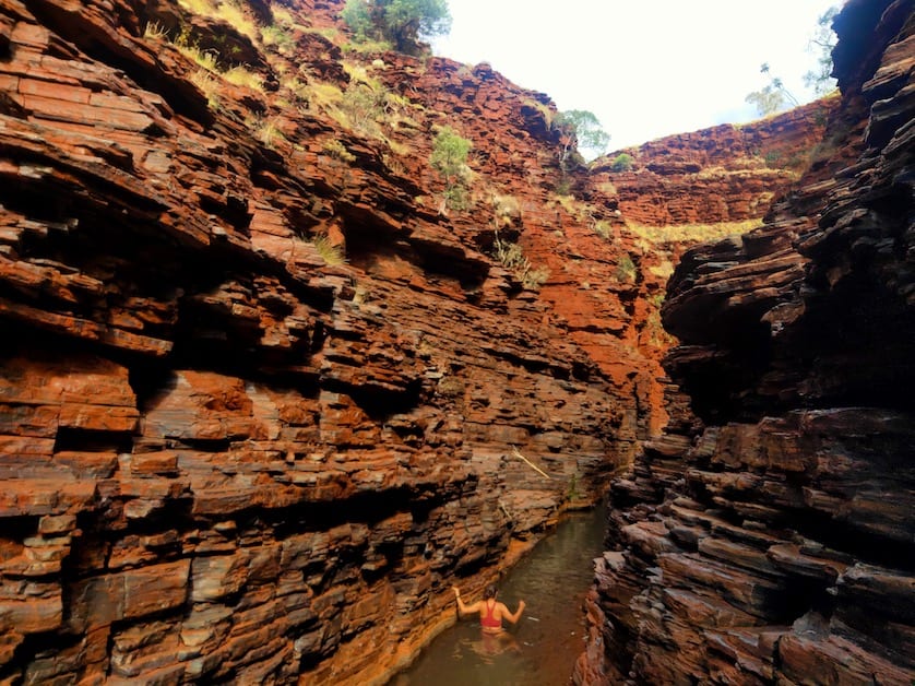 A woman wading in Hancock Gorge