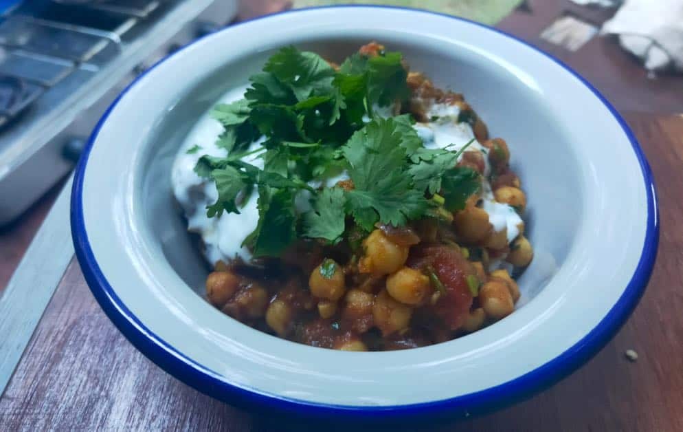 A bowl of easy Chana Masala a simple vegetarian Indian curry for van life