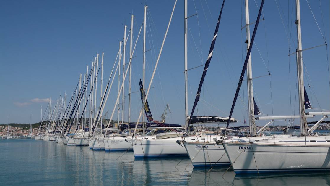 Sailboats in a row in a marina,  ready to prepare a Sailboat for Winter Storage in the Mediterranean