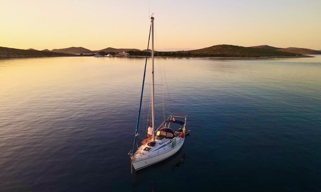 Liveaboard Lifestyle Pros and Cons: Is Sail Life Right for You? 9 sunset boat kornati Croatia Liveaboard Lifestyle Pros and Cons: Is Sail Life Right for You?