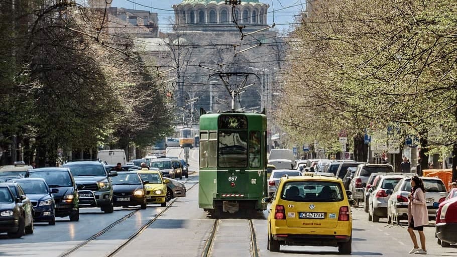 Sofia city with taxis, trams and cars
